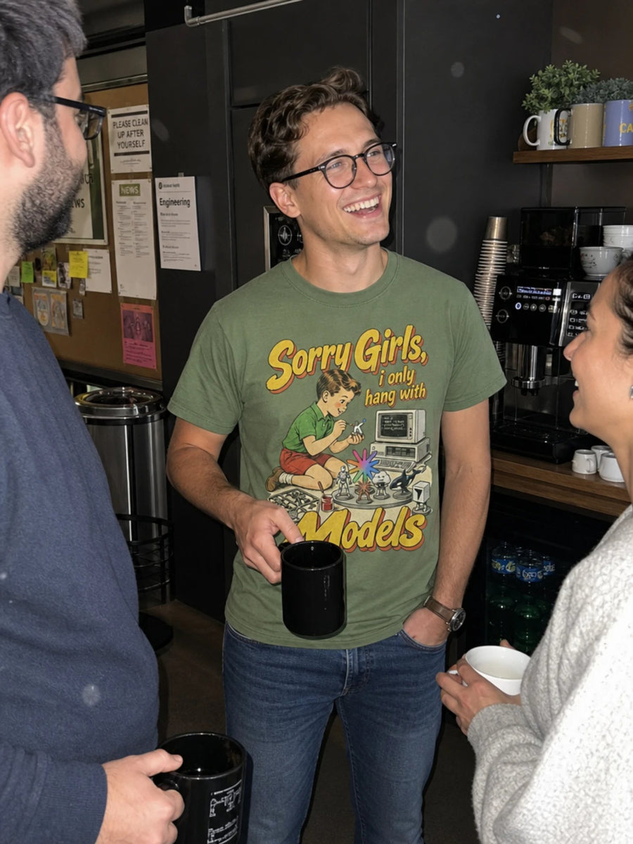 Developer laughing with coworkers in the Sorry Girls, I only hang with Models tee