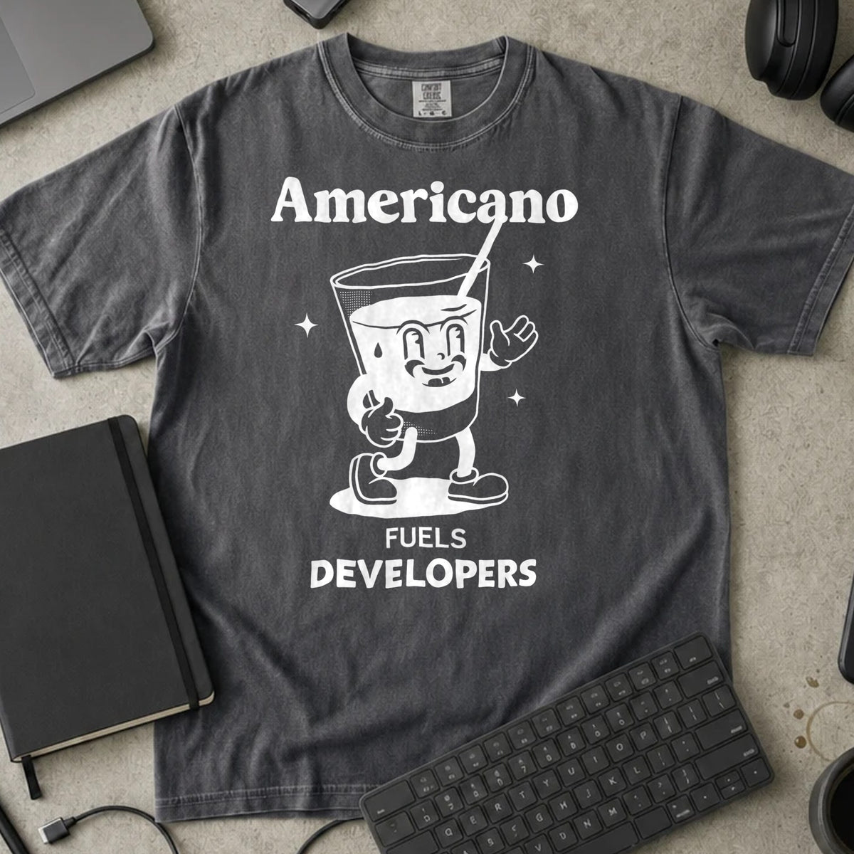 Americano Fuels Developers Shirt in Pepper, Comfort Colors 1717 tee flat lay