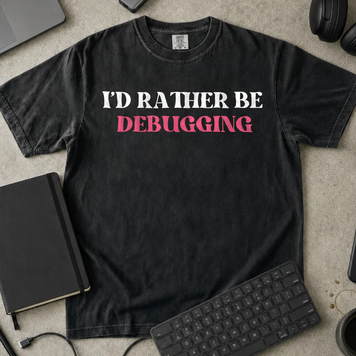I'd Rather Be Debugging Shirt in Black, Comfort Colors 1717 tee flat lay