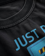 just put in a ticket Premium Shirt — 100% Ringspun Cotton Macro Detail