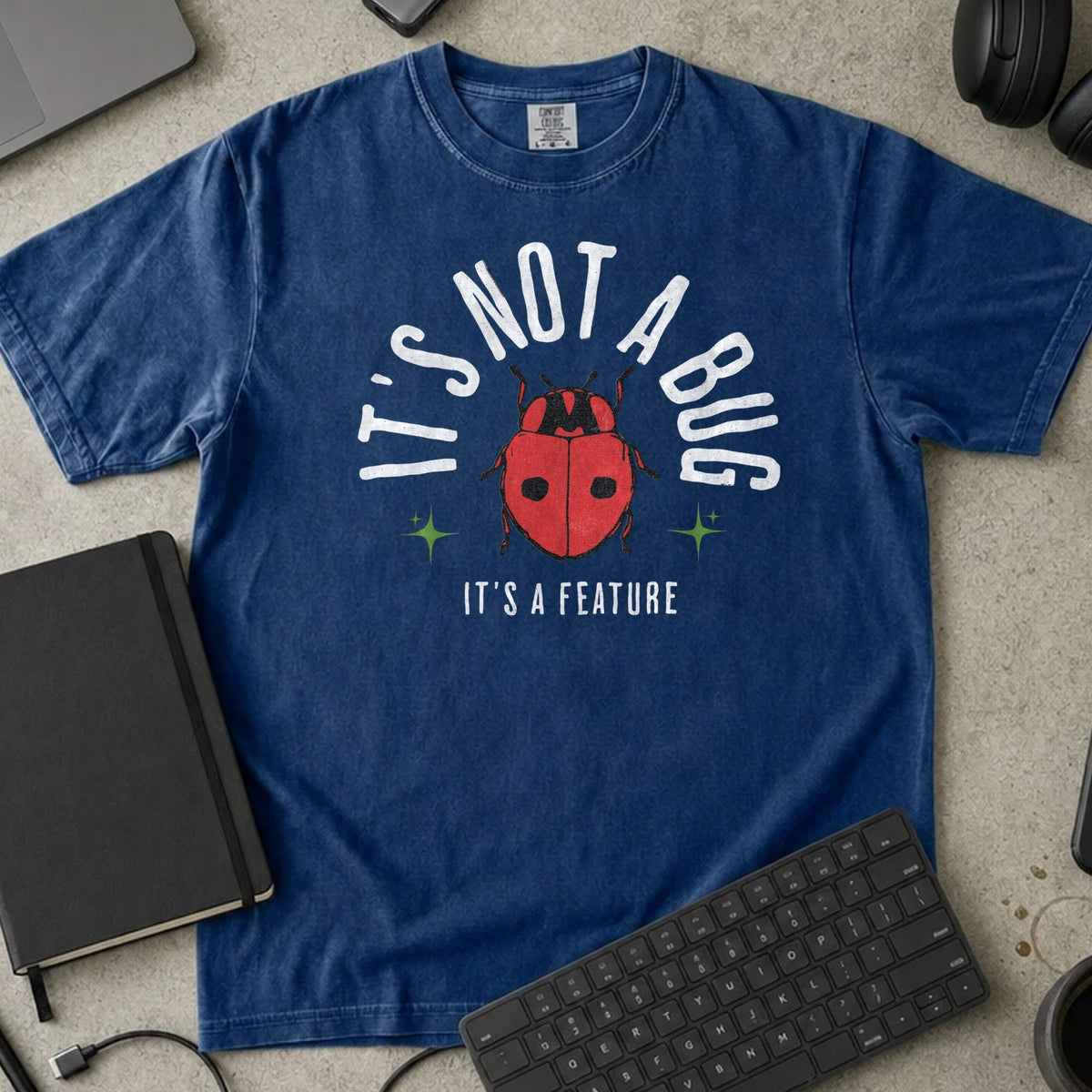 It's Not a Bug It's a Feature Shirt in True Navy, Comfort Colors 1717 tee flat lay