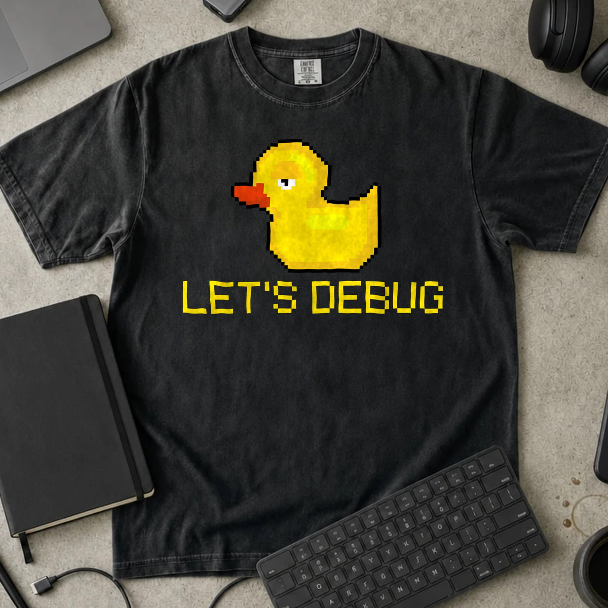 Let's Debug Pixel Duck Shirt in Black, Comfort Colors 1717 tee flat lay