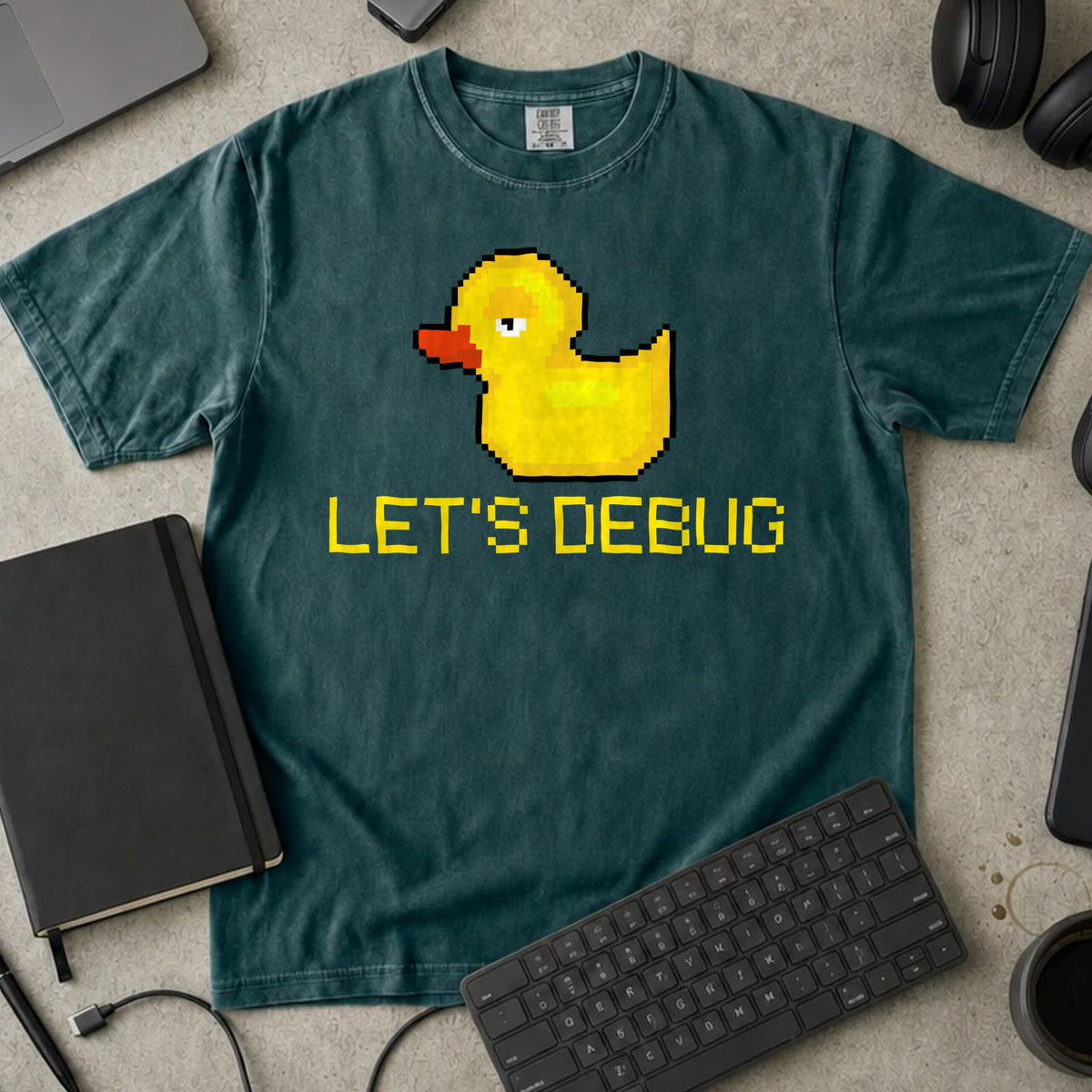 Let's Debug Pixel Duck Shirt in Blue Spruce, Comfort Colors 1717 tee flat lay