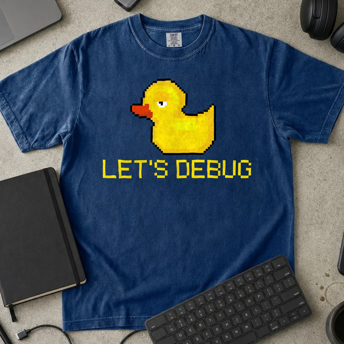 Let's Debug Pixel Duck Shirt in True Navy, Comfort Colors 1717 tee flat lay