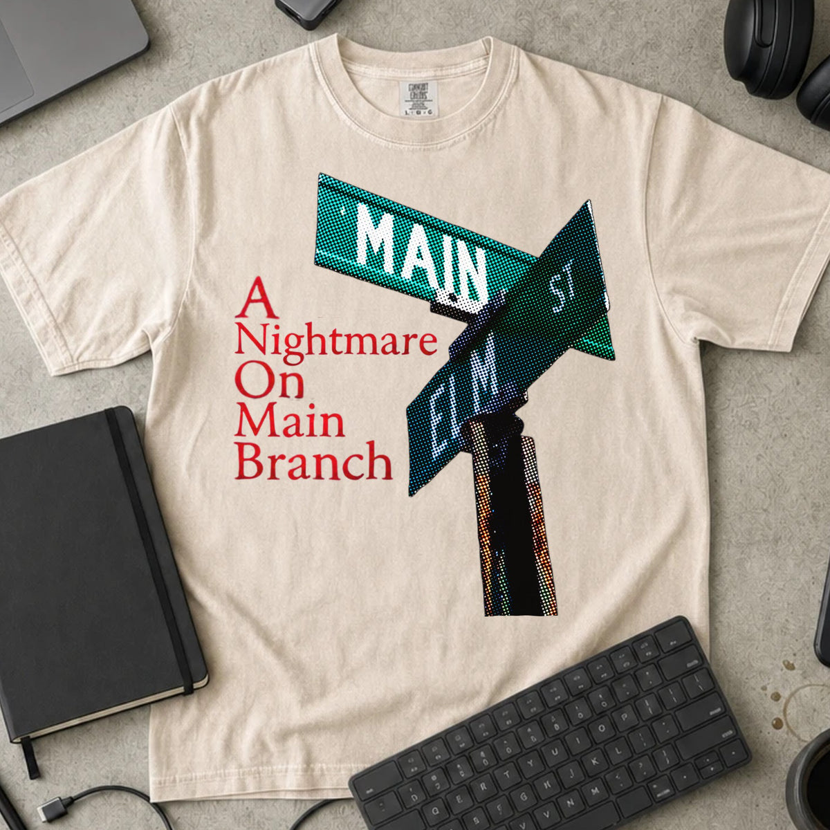 A Nightmare on Main Branch Shirt in Ivory, Comfort Colors 1717 tee flat lay