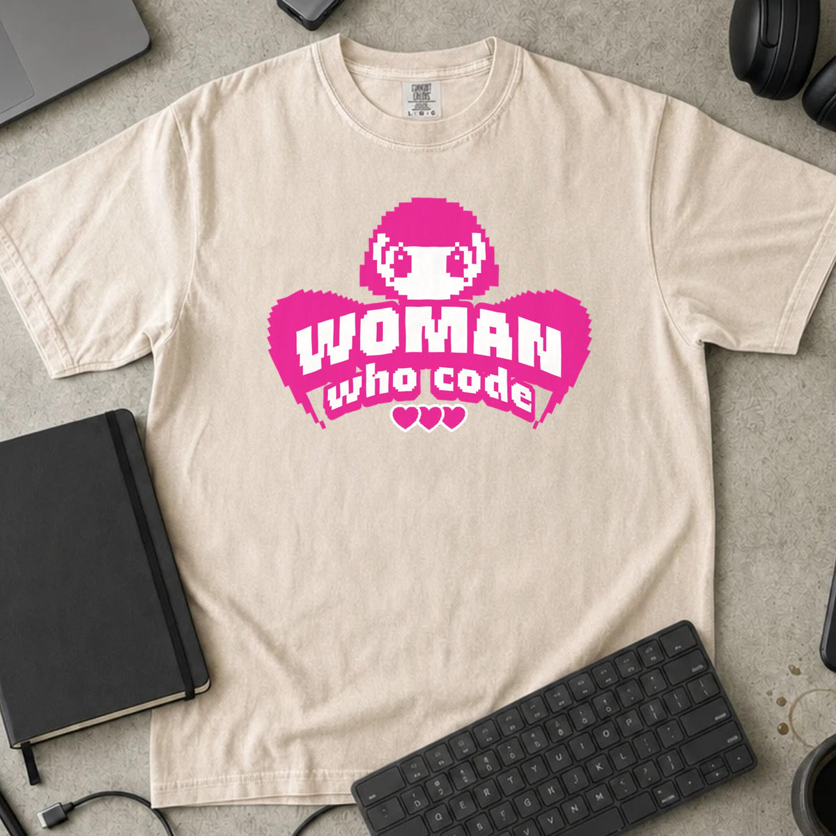 Woman Who Code Pixel Shirt in Ivory, Comfort Colors 1717 tee flat lay