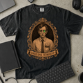 Cursed Since the Migration Shirt — Black Comfort Colors 1717 flat lay