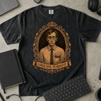Cursed Since the Migration Shirt — Black Comfort Colors 1717 flat lay