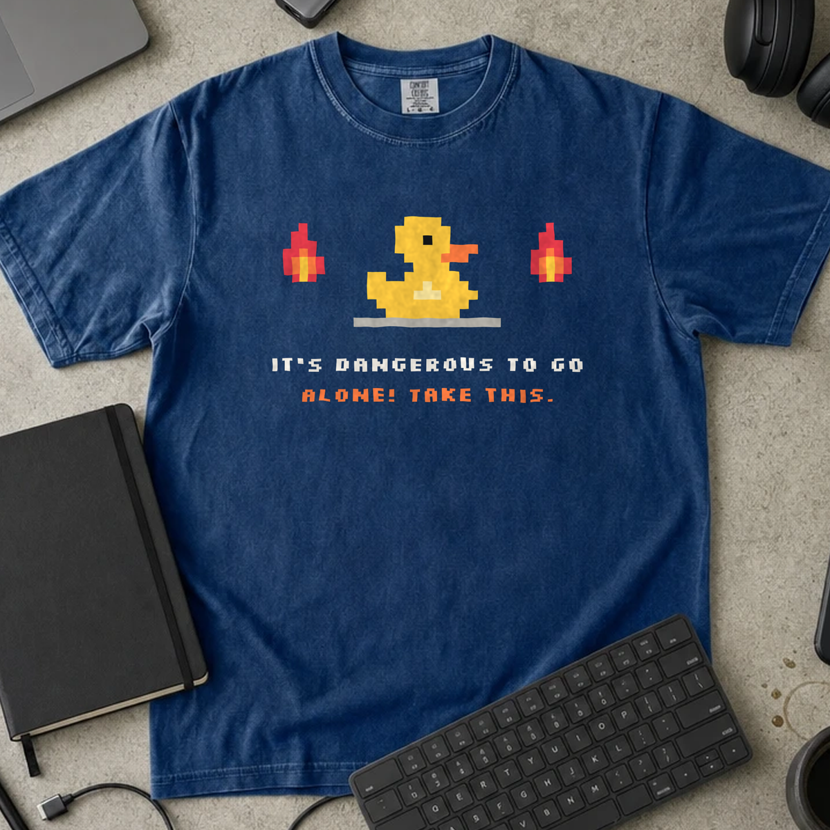 It's Dangerous to Go Alone! Take This. Shirt — True Navy Comfort Colors 1717 flat lay