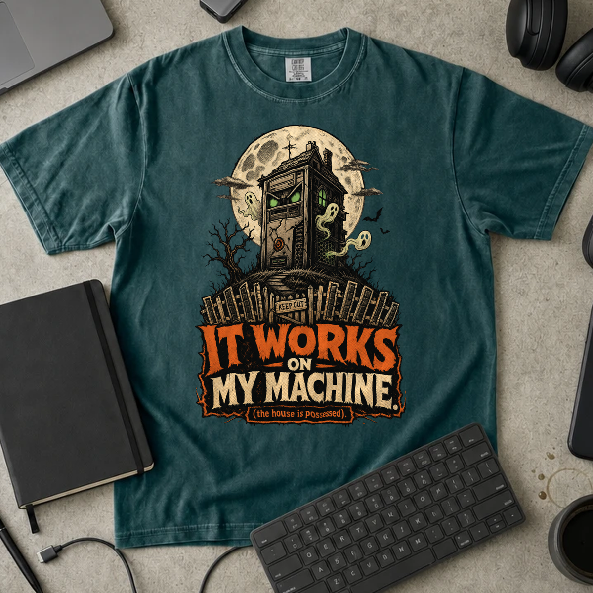 It Works on My Machine The House Is Possessed Shirt — Blue Spruce Comfort Colors 1717 flat lay