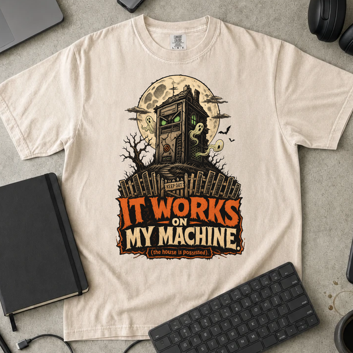 It Works on My Machine The House Is Possessed Shirt — Ivory Comfort Colors 1717 flat lay