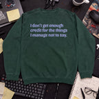 Not Enough Credit Sweatshirt — Bottle Green