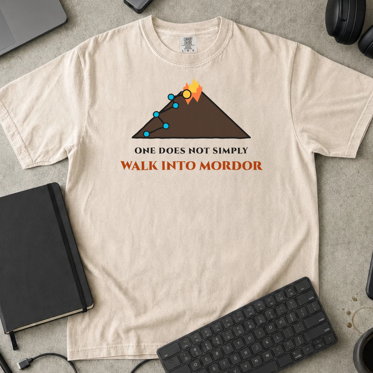 One Does Not Simply Walk Into Mordor Shirt — Ivory Comfort Colors 1717 flat lay