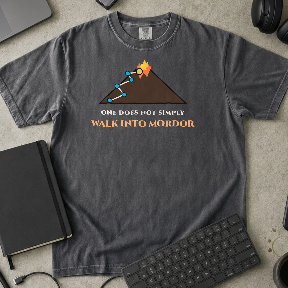 One Does Not Simply Walk Into Mordor Shirt — Pepper Comfort Colors 1717 flat lay