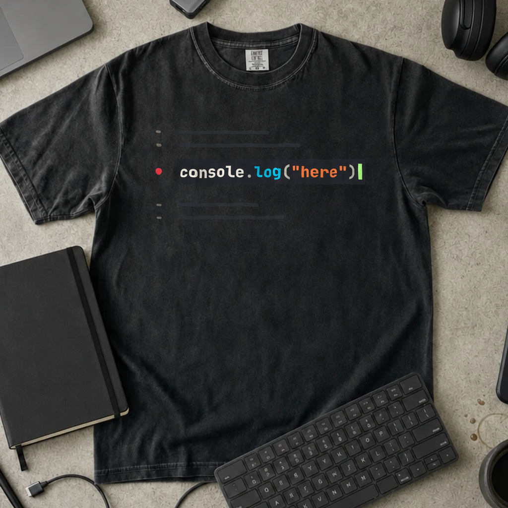 Console Log Here Shirt — Black Comfort Colors 1717 flat lay