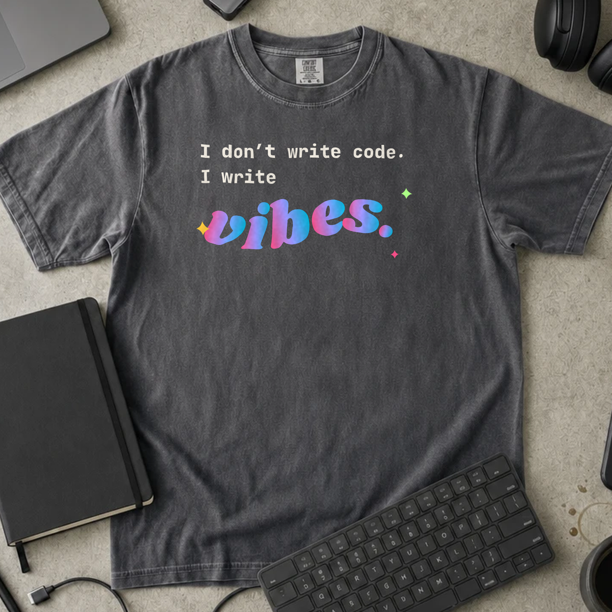 I Don't Write Code I Write Vibes Shirt — Pepper Comfort Colors 1717 flat lay