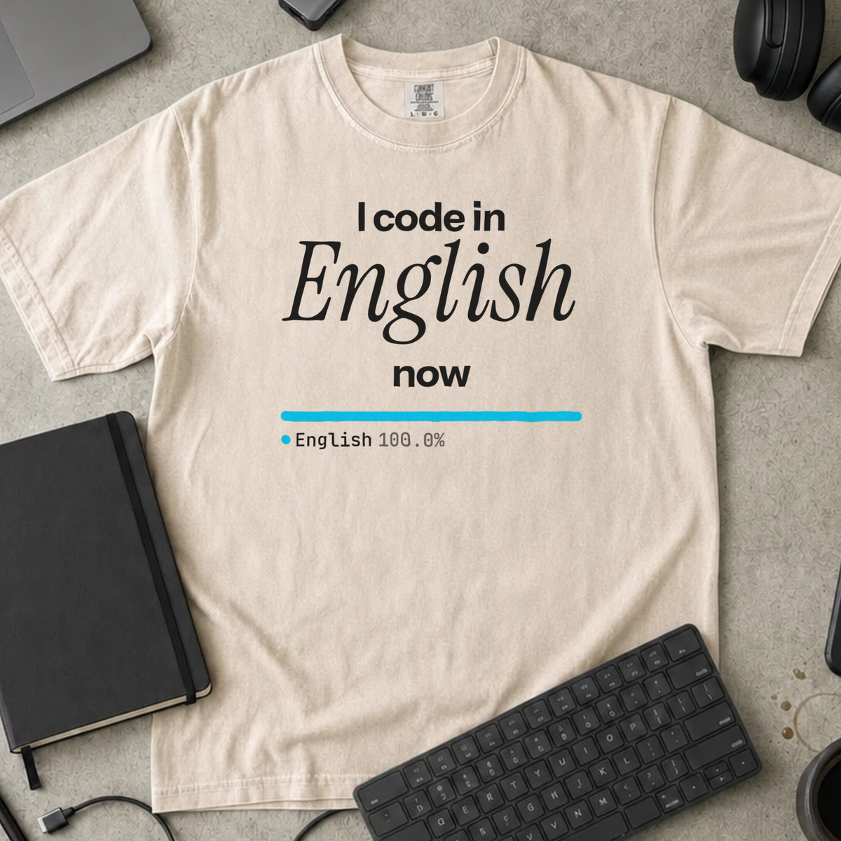 I Code in English Now Shirt — Ivory Comfort Colors 1717 flat lay