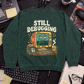 Still Debugging And Caffeinated Sweatshirt — Bottle Green