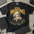 Still Moving Shirt — Black Comfort Colors 1717 flat lay