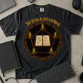 The Ritual Is Just a Runbook Shirt — Black Comfort Colors 1717 flat lay