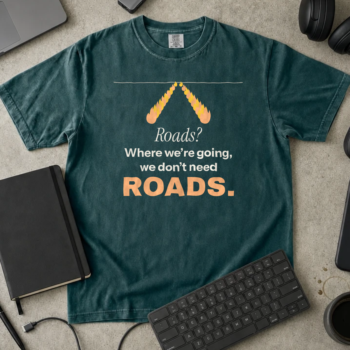 Roads? Where We're Going We Don't Need Roads Shirt — Blue Spruce Comfort Colors 1717 flat lay